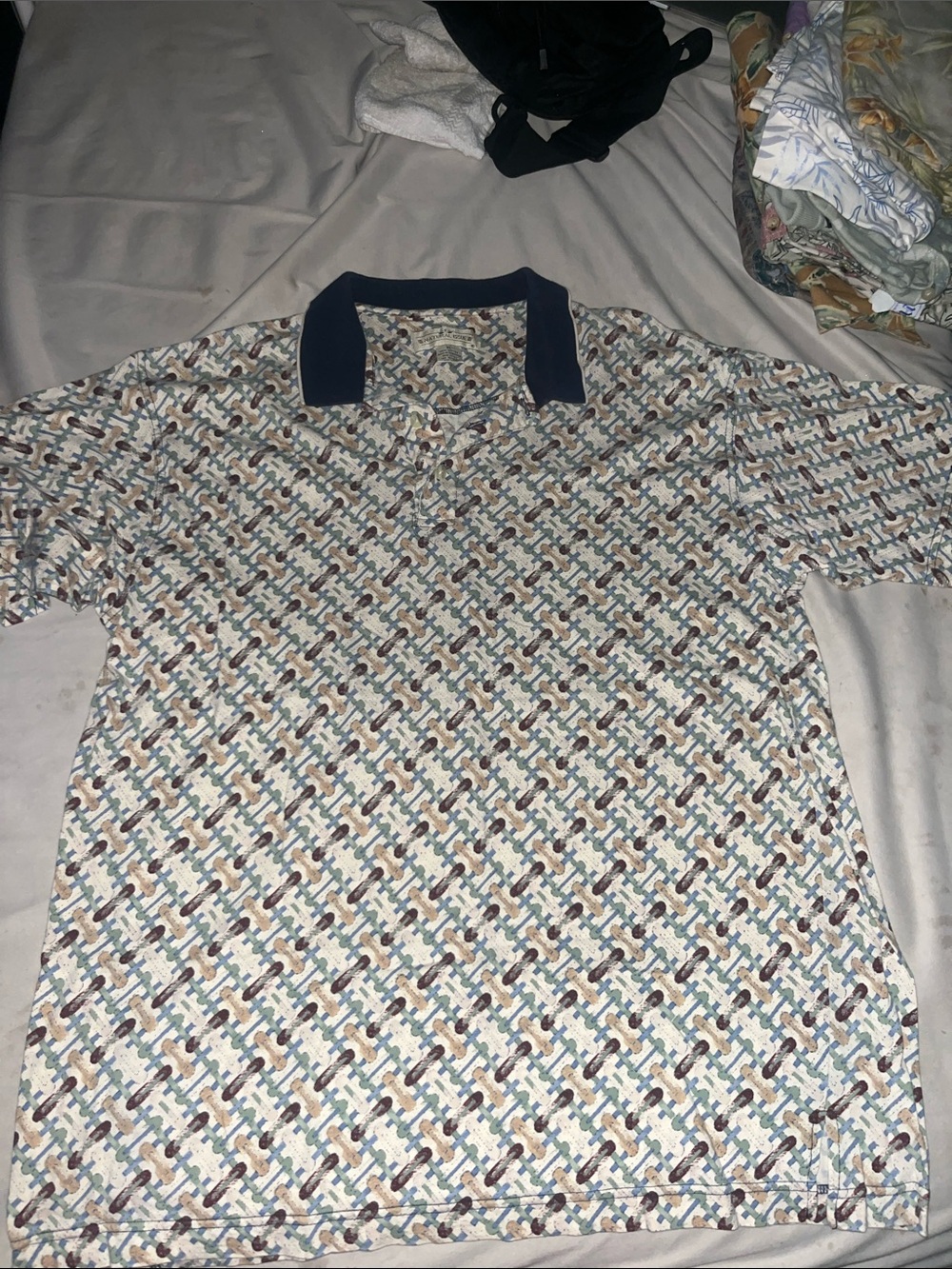 Classic Short-Sleeve Polo in Navy Collar with Multi-Color Geometric Print